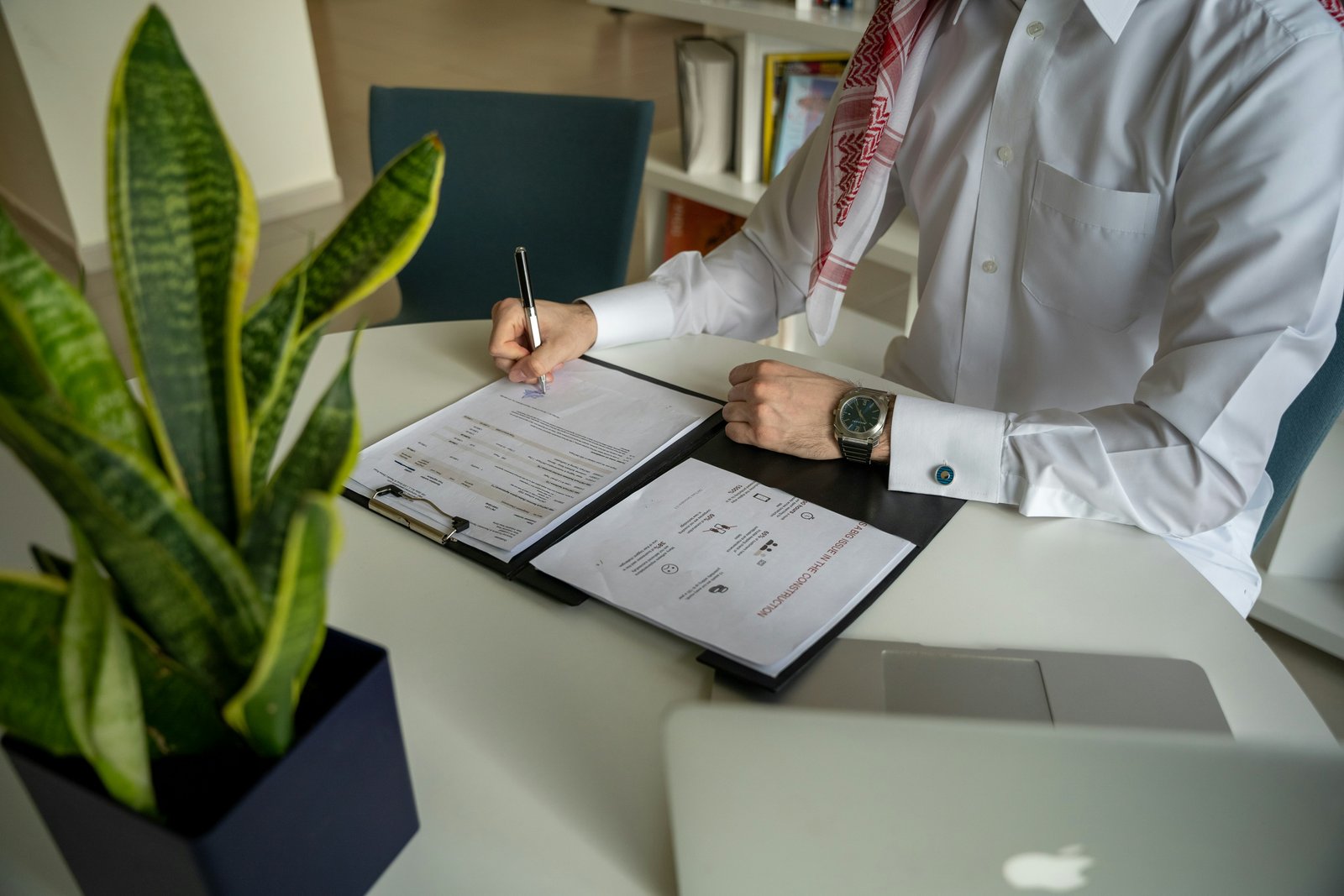 Saudi business professionals in modern office